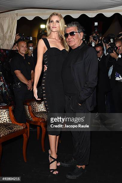 Rosie Huntington-Whiteley and Roberto Cavalli attend the "Roberto Cavalli Annual Party Aboard" : Outside Arrivals at the 67th Annual Cannes Film...