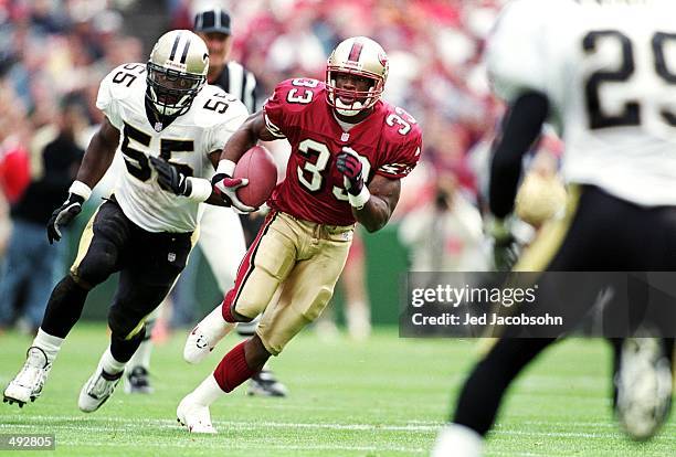 Lawrence Phillips of the San Francisco 49ers carries the ball during the game against the New Orleans Saints at 3Com Park in San Francisco,...