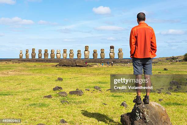 man in front of ahu tongariki beautiful landscape - easter island fotografías e imágenes de stock