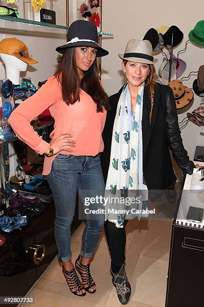 Amber Marchese and Dina Manzo attend the "Momstrology" book launch party at Henri Bendel on April 22, 2014 in New York City.