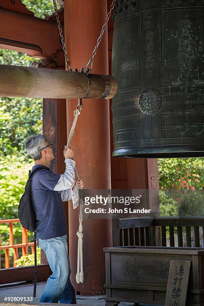 Ringing Temple Bell at Enryakuji - Enryaku-ji is located on Mount Hiei, overlooking Kyoto, and is the headquarters of the Tendai sect. Founded during...