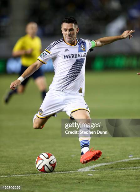 Robbie Keane of the Los Angeles Galaxy shoots against FC Dallas at StubHub Center on May 21, 2014 in Los Angeles, California. The Galaxy won 2-1.