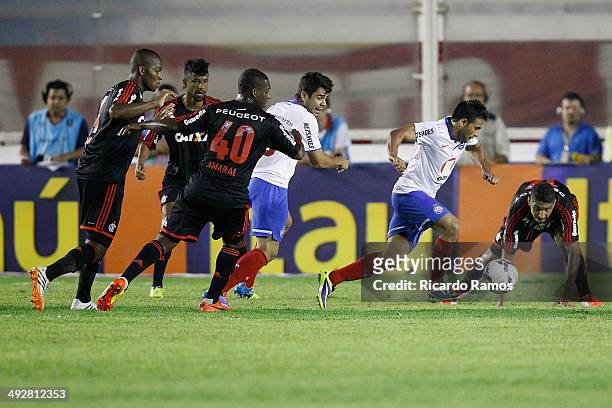 Wallace of Flamengo battle for the ball with Max Biancucchi of Bahia during the match between Flamengo and Bahia as part of Brazilian Series A 2014...