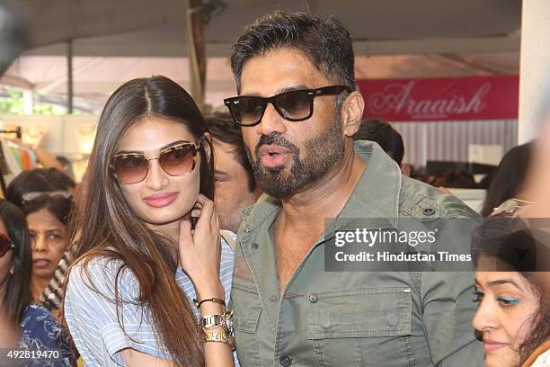 Bollywood actor Suniel Shetty with daughter and actor Athiya Shetty at wife Mana Shetty's designer store anniversary celebrations at Araaish...