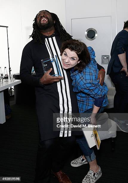 Booker Prize winner author Marlon James and Caitlin Moran laugh backstage during day one of Stylist Magazine's first ever 'Stylist Live' event at the...