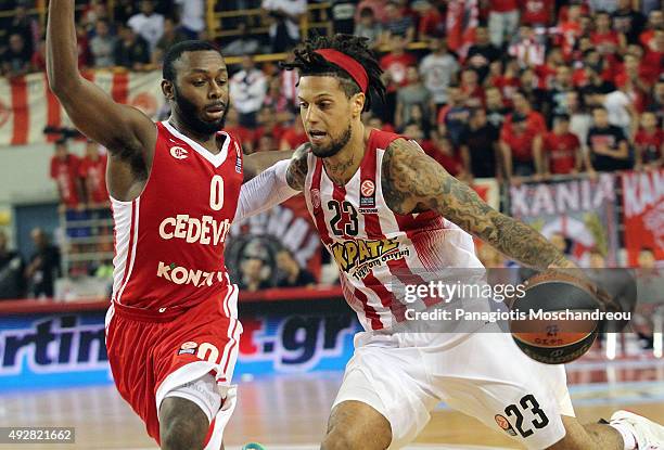 Daniel Hackett, #23 of Olympiacos Piraeus competes with Jacob Pullen, #0 of Cedevita Zagreb during the Turkish Airlines Euroleague Basketball Regular...