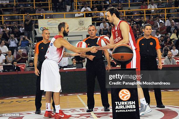 Vassilis Spanoulis, #7 of Olympiacos Piraeus exchanges balls with Miro Bilan, #15 of Cedevita Zagreb during the Turkish Airlines Euroleague...