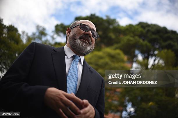 The lawyer of former Guatemalan President Otto Perez Molina, Moises Galindo, speaks with journalits after handing over a letter to Ecuador President...