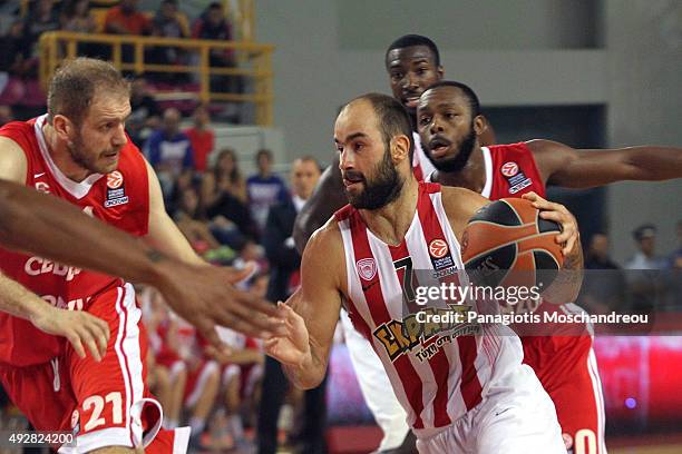 Vassilis Spanoulis, #7 of Olympiacos Piraeus competes with Luka Zoric, #21 of Cedevita Zagreb during the Turkish Airlines Euroleague Basketball...