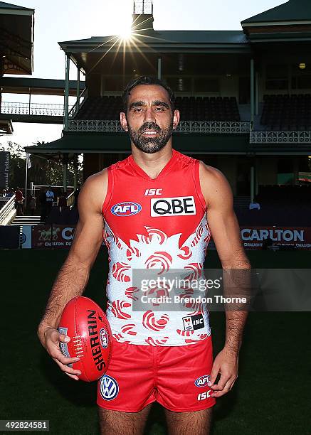 Adam Goodes, wearing the Sydney Swans Indigenous Round guernsey designed by his mum Lisa Sansbury, poses following a Sydney Swans AFL press...