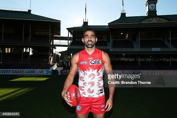 Adam Goodes, wearing the Sydney Swans Indigenous Round guernsey designed by his mum Lisa Sansbury, poses following a Sydney Swans AFL press...