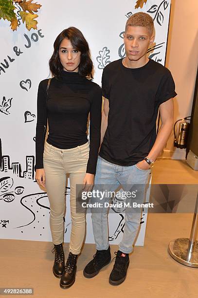 Ashley Sky and Chuck Achike attend the launch of the Paul & Joe London flagship store hosted by Grey Goose on October 15, 2015 in London, England.