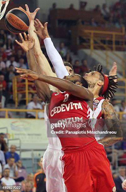 Jacob Pullen, #0 of Cedevita Zagreb competes with Daniel Hackett, #23 of Olympiacos Piraeus during the Turkish Airlines Euroleague Basketball Regular...