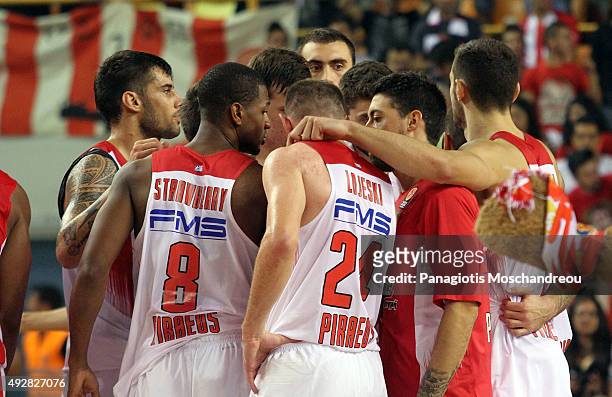 Players of Olympiacos gather after their team's victory during the Turkish Airlines Euroleague Basketball Regular Season Date 1 game Olympiacos...