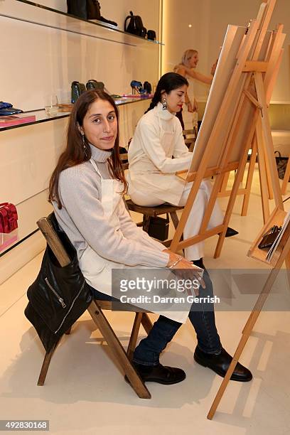 Stephanie Waknine and Caroline Issa attend the Christopher Kane Art Class 2015 at Christopher Kane Flagship 6-7 Mount Street on October 15, 2015 in...