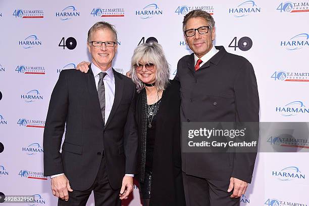 S Alan Hunter, Nina Blackwood, and Mark Goodman attend the T.J. Martell 40th Anniversary NY Gala at Cipriani Wall Street on October 15, 2015 in New...