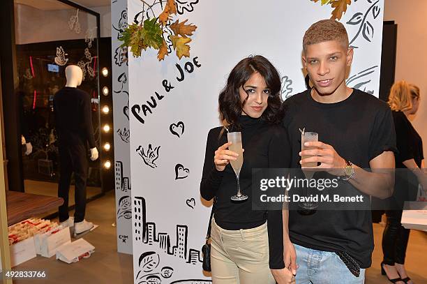 Ashley Sky and Chuck Achike attend the launch of the Paul & Joe London flagship store hosted by Grey Goose on October 15, 2015 in London, England.