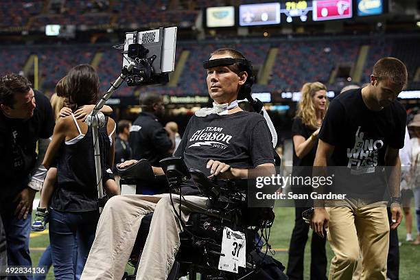 Former New Orleans Saints player Steve Gleason watches action prior to a game between the New Orleans Saints and the Atlanta Falconsat the...