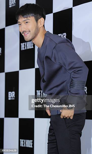 Choi Siwon of Super Junior attends the EXR flagship store opening event at Sinsa-dong on October 12, 2015 in Seoul, South Korea.
