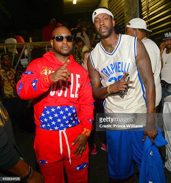 Freekey Zekey and 2 Chainz attend Battle of the Black Top BasketBall Game at Street Execs Studios on October 8, 2015 in Atlanta, Georgia.