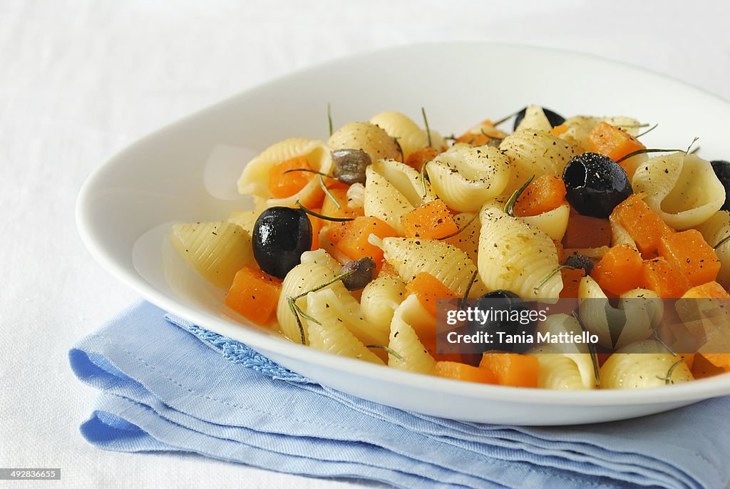 Pasta with pumpkin and black olives