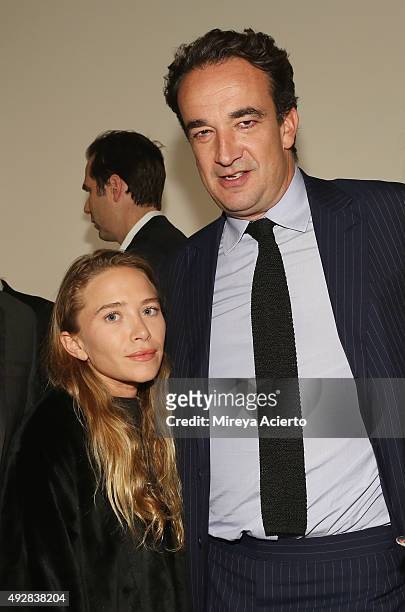 Mary-Kate Olsen and Olivier Sarkozy attend 2015 Take Home a Nude Art Auction and Party at Sotheby's on October 15, 2015 in New York City.