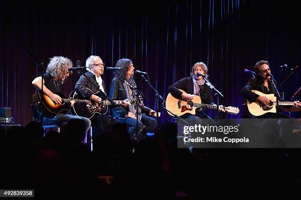 Bruce Watson, Mick Jones, Kelly Hansen, Jeff Pilson and Thom Gimbel of Foreigner perform onstage at the T.J. Martell 40th Anniversary NY Gala at...