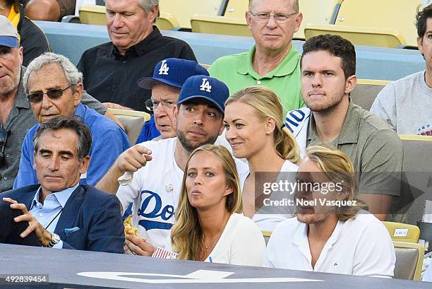 Zach Levi and Yvonne Strahovski attend game five of the National League Division Series between the New York Mets and the Los Angeles Dodgers at...