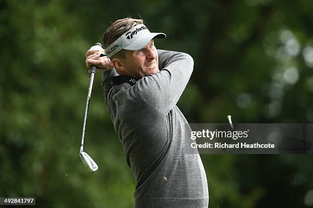 David Lynn of England tees off on the 2nd hole during day one of the BMW PGA Championship at Wentworth on May 22, 2014 in Virginia Water, England.
