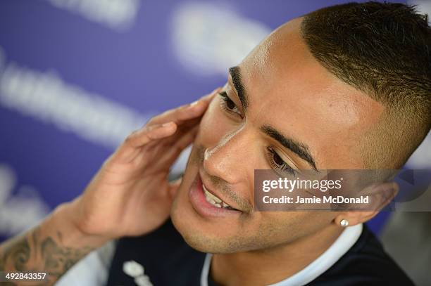 Danny Simpson of Queens Park Rangers talks to the media during a Queens Park Rangers press conference on May 22, 2014 in Harlington, England.