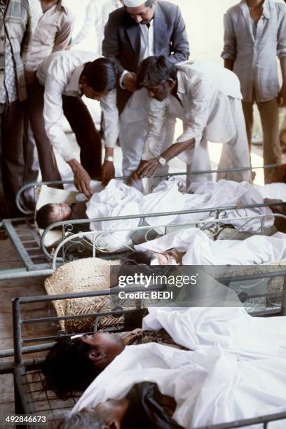 Children, victims of the Bhopal tragedy, receives first aid from doctors at Bhopal's hospital on December 04, 1984 after a poison gas leak from the...