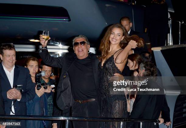 Roberto Cavalli and Irina Shayk attend the Roberto Cavalli yacht party at the 67th Annual Cannes Film Festival on May 21, 2014 in Cannes, France.