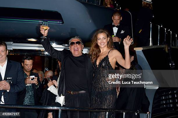 Roberto Cavalli and Irina Shayk attend the Roberto Cavalli yacht party at the 67th Annual Cannes Film Festival on May 21, 2014 in Cannes, France.