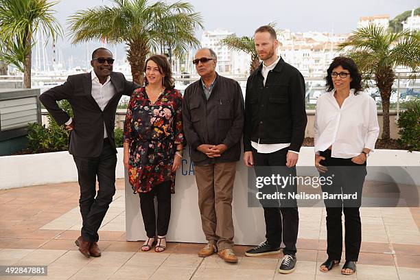 Directors Mahamat Saleh Haroun, Noemie Lvovsky, Abbas Kiarostami, Joachim Trier and Daniela Thomas attend the Short Films Jury photocall during the...