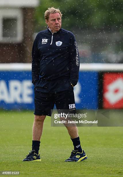 Harry Redknapp, Manager of Queens Park Rangers looks on during a Queens Park Rangers training session on May 22, 2014 in Harlington, England.