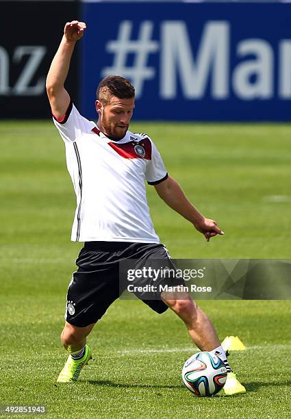 Shkodran Mustafi runs with the ball during the German National team training session at St.Martin training ground on May 22, 2014 in St.Martin in...