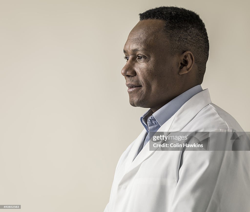 Black male in laboratory coat