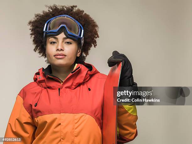 young black female with snowboard - ski wear stock pictures, royalty-free photos & images