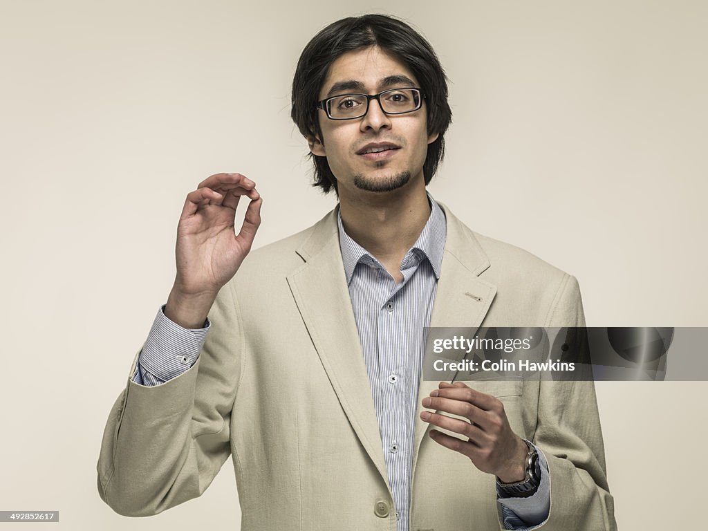 Asian man gesticulating