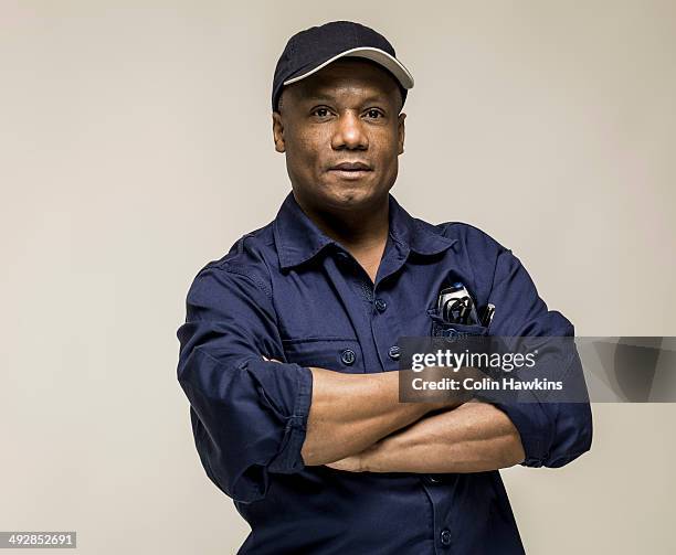 black male in work clothes - construction worker pose stock pictures, royalty-free photos & images