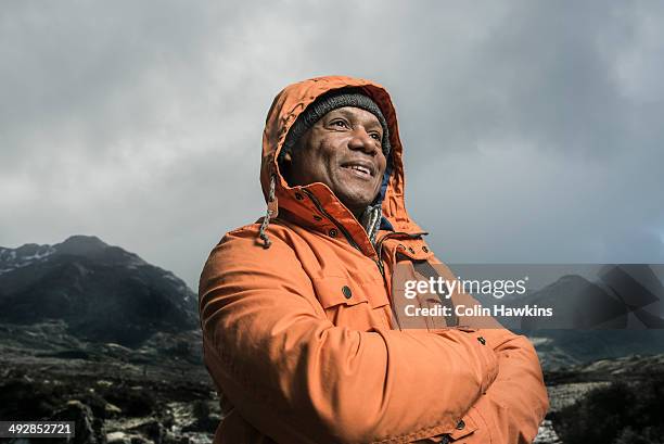 black male walking in moorland - man adventure fotografías e imágenes de stock