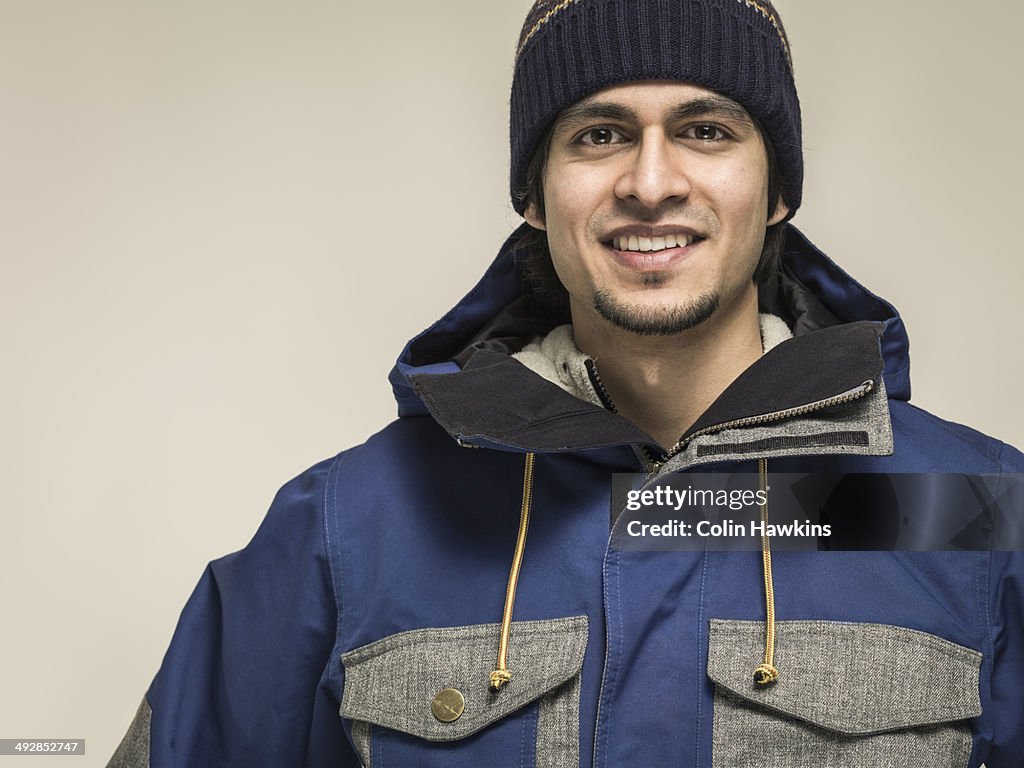 Asian man wearing winter clothing