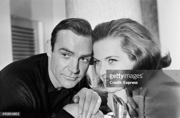Portrait of James Bond actors Sean Connery and Honor Blackman, to promote the film 'Goldfinger', 1964.