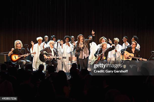 Bruce Watson, Mick Jones, Kelly Hansen, Jeff Pilson and Thom Gimbel of Foreigner perform onstage at the T.J. Martell 40th Anniversary NY Gala at...