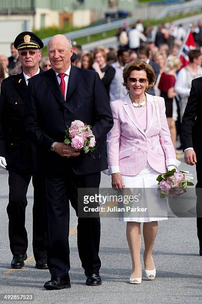 King Harlad of Norway and Queen Sonja of Norway visit the community of Aure on May 21, 2014 in More And Romsdal County, Norway. King Harald And Queen...