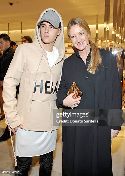 Singer Justin Bieber and designer Anya Hindmarch attend The Anya Hindmarch Service Station Collection hosted by Barneys New York along with Jena...