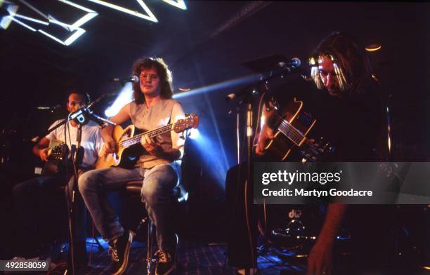 Def Leppard perform an acoustic show at Wapentake Club, Sheffield, United Kingdom, 5th October 1995. L-R Rick Savage and Joe Elliott .