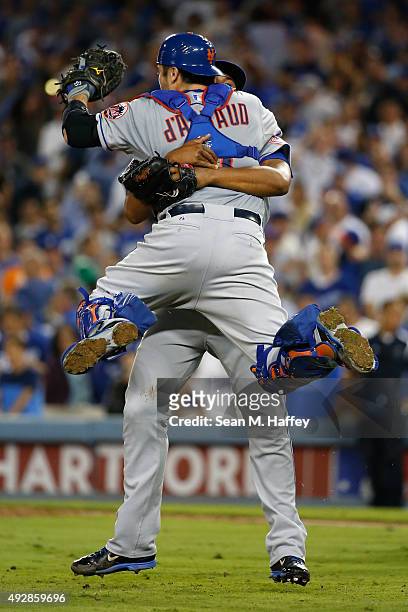 Jeurys Familia and Travis d'Arnaud of the New York Mets celebrate after the Mets 3-2 victory against the Los Angeles Dodgers in game five of the...