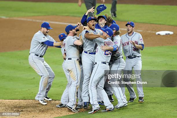 Jeurys Familia of the New York Mets celebrates with teammates after the Mets 3-2 victory against the Los Angeles Dodgers in game five of the National...