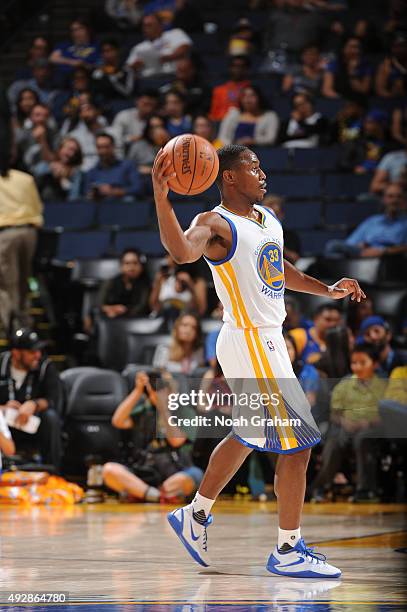 Juwan Staten of the Golden State Warriors handles the ball against the Houston Rockets on October 15, 2015 at Oracle Arena in Oakland, California....